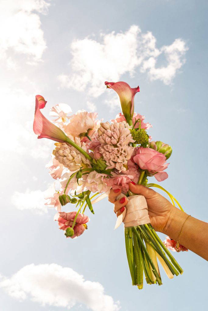 Nina Dom Manchester Wedding Flowers held in the sky